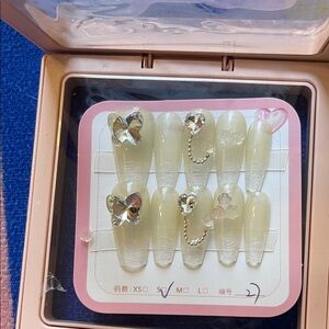 Elegant Cream Press-On Nails with Rhinestone Accents